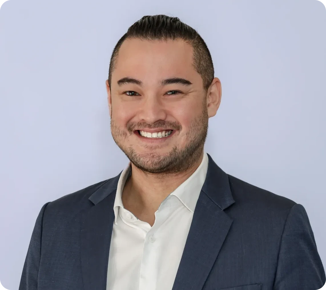 Professional headshot with a smile